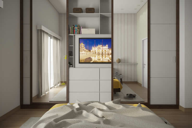 Quarto amarelo com TV